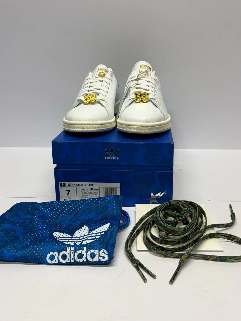 adidas Stan Smith White Sneakers with Gold Accents and Camo Heel